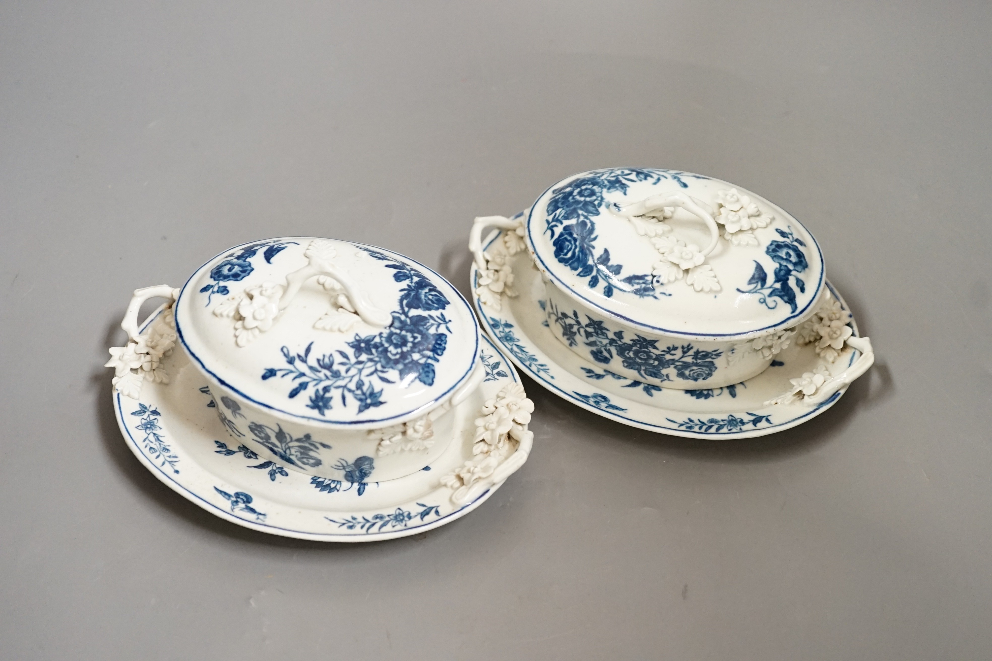 A pair of Caughley blue and white butter tubs, covers and stands, c.1780, stands 19cms wide, tubs and covers 9cms high